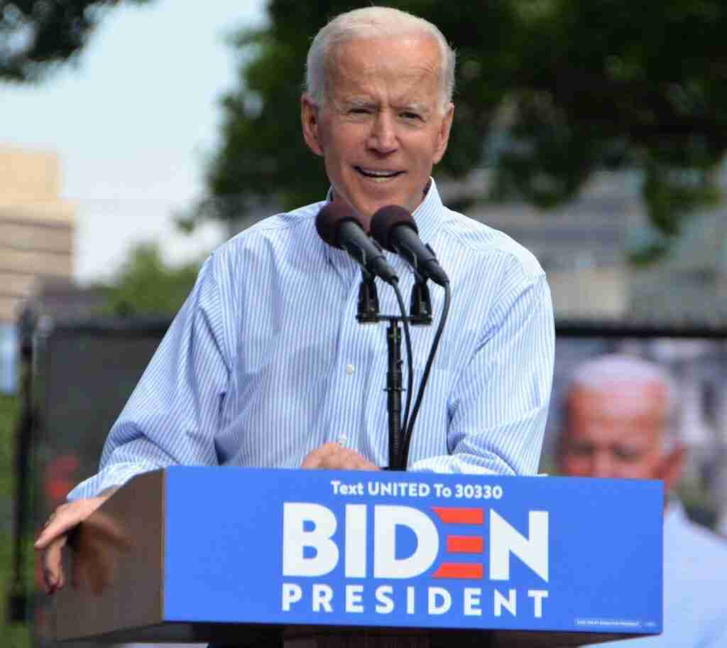 President Joe Biden speaking on stage